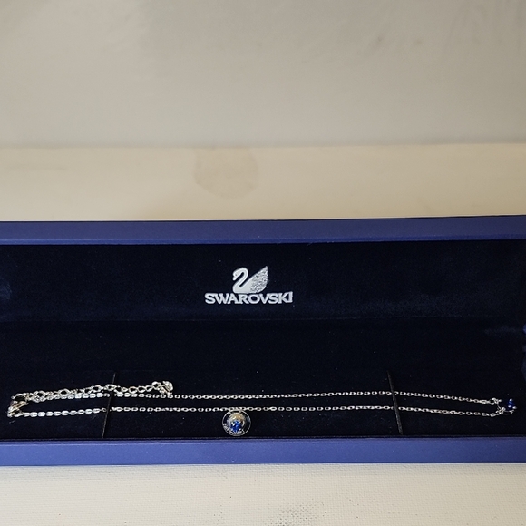 Swarovski Jewelry - Swarovski Necklace with One Side Earing Blue Accent